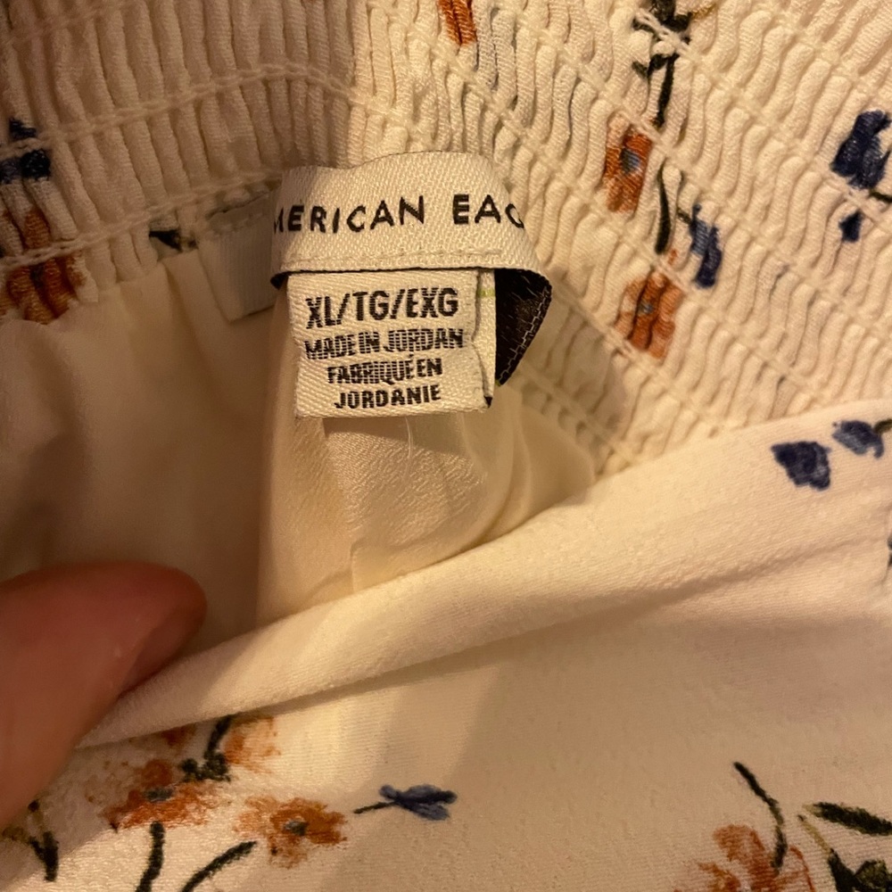 White and floral pants